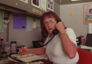 Brenda Thomas manning the phone at AIDS Foundation Houston
